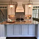 white kitchen pendant lights glitzy back splash granite counter tops