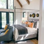 master bedroom with vaulted beamed ceilings - Luxury Modern Farmhouse