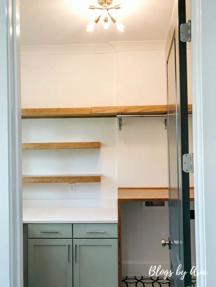 laundry room with floating shelves