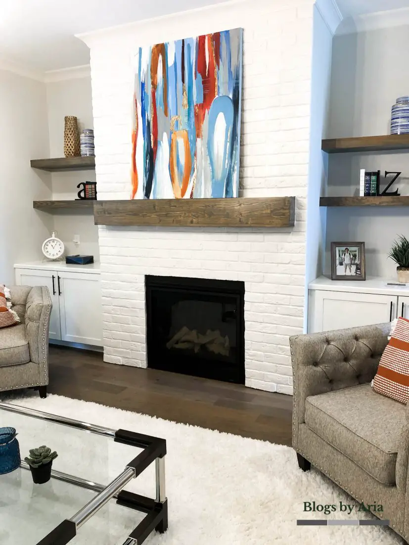 modern farmhouse living room design with white painted brick fireplace