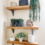 modern farmhouse styled bathroom floating shelves