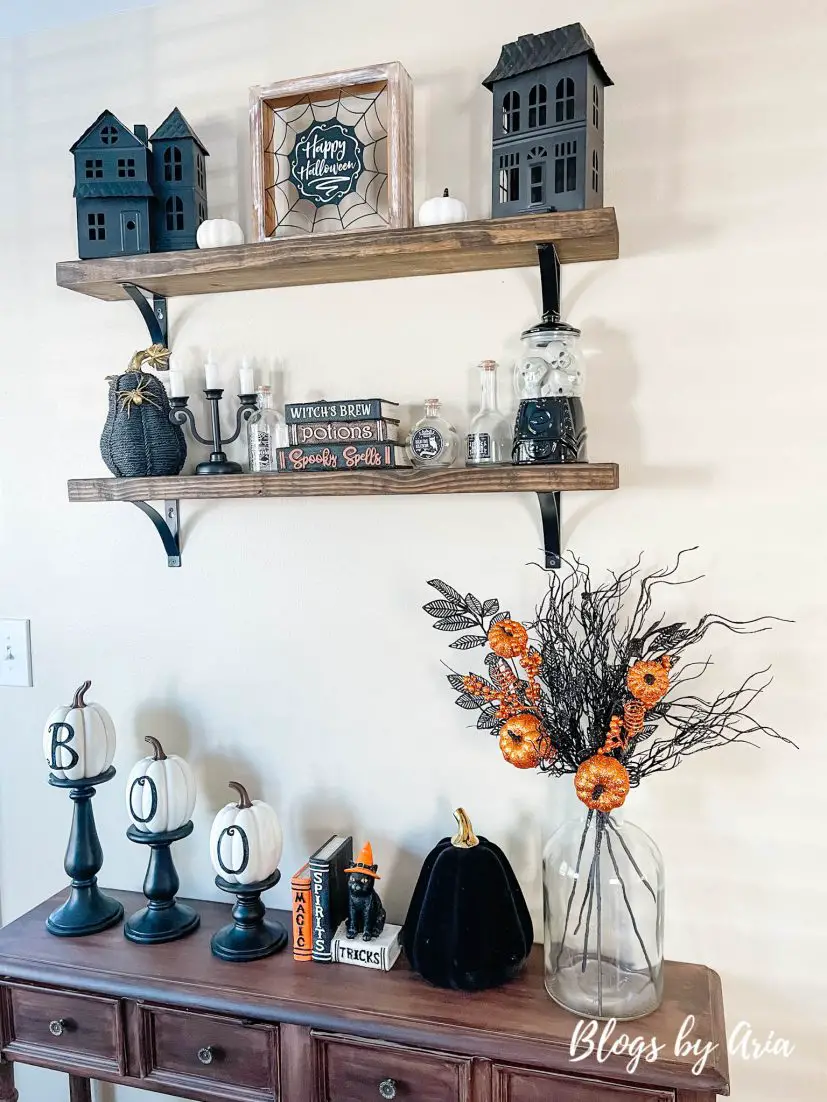 how to style halloween floating shelves
