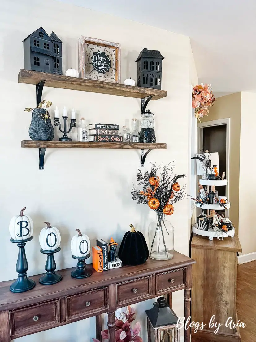 floating shelves decorated for halloween