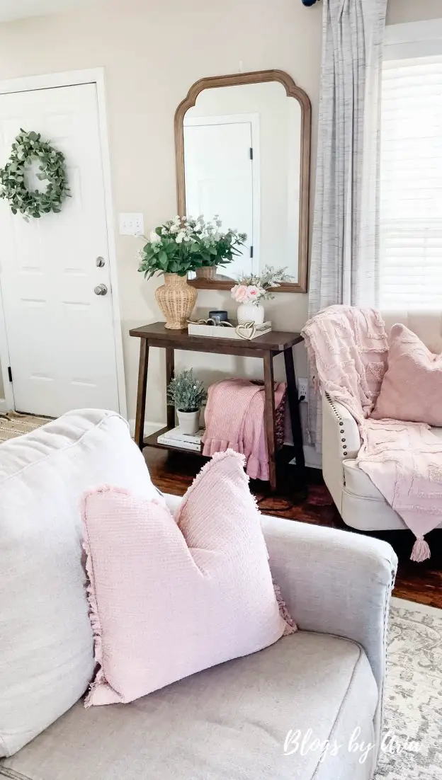 living room entryway table decorated for Spring