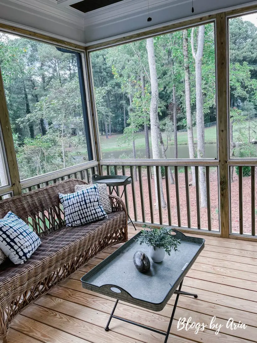 screened in porch with full view patio door and outdoor ceiling fan
