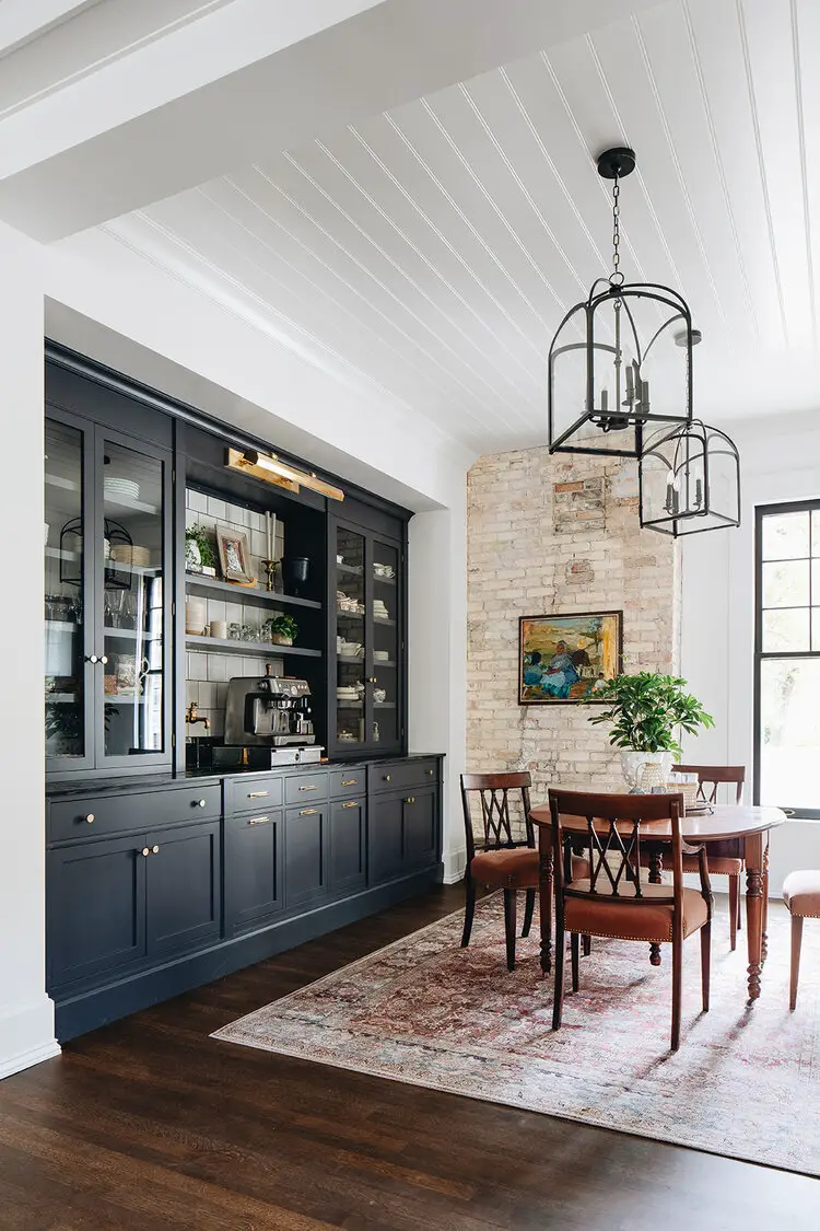 breakfast nook with built in buffet server and coffee bar