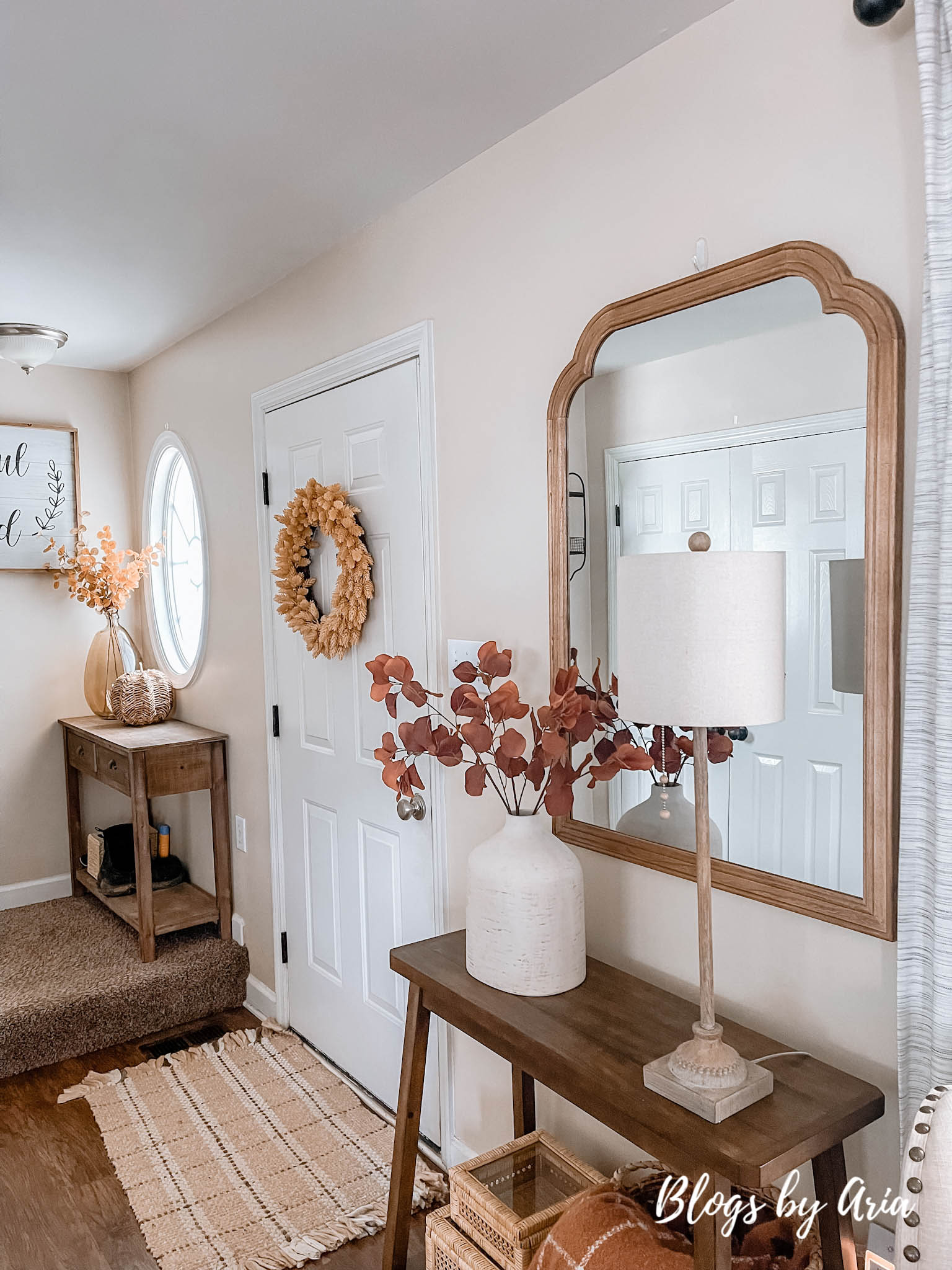 fall entryway small space entryway decorating for Fall with cream vase filled with beautiful brown stems and window pane fall throw blanket in basket