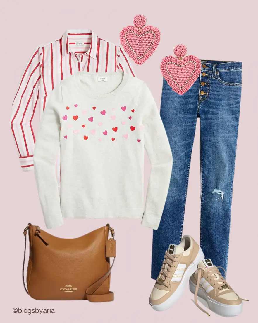 Valentine's Outfit Ideas with heart sweater over pink striped shirt